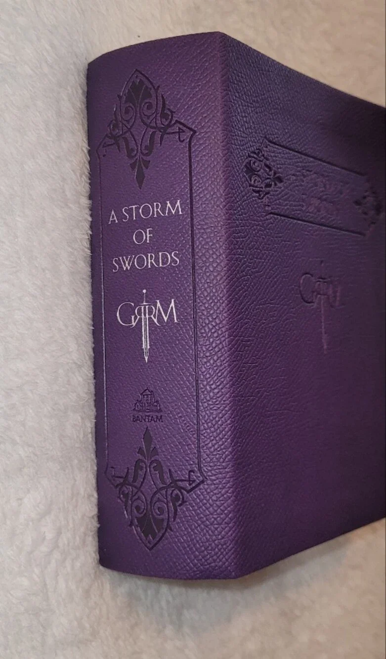 A Storm of Swords Purple Leather-bound Mini Book,  GRRM